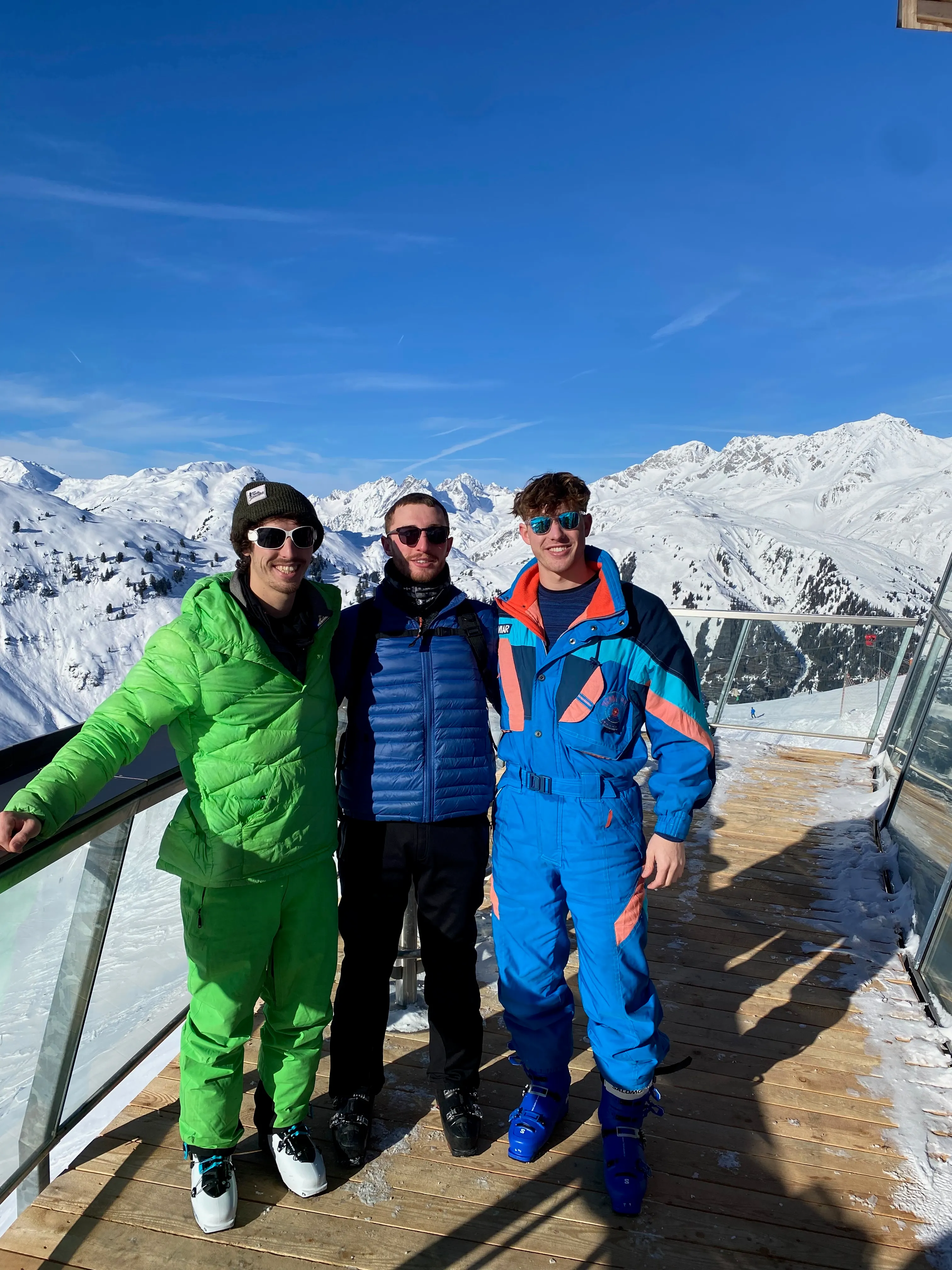 The lads at St. Anton with mountain views behind